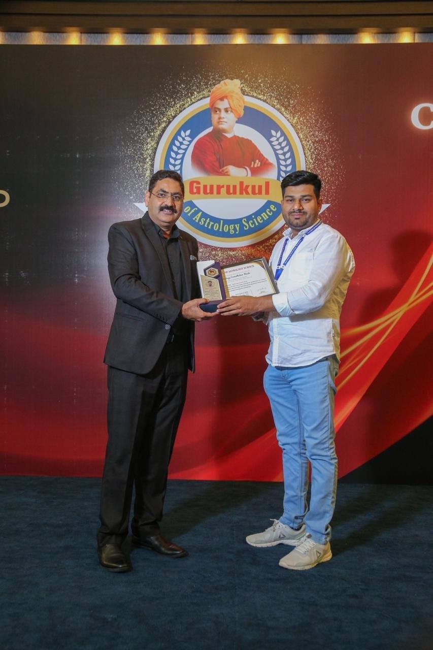 Acharya Arun Pandit receiving certification from Gurukul of Astrology Science